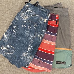 Lot of three (3) men’s swim trunks - Penguin & United by Blue. (30/30/31).